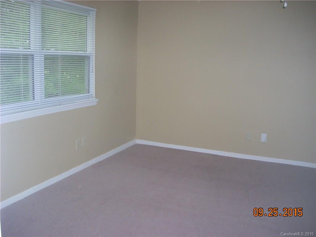 9424 Fairway Ridge Road Charlotte, NC 28277 - Photo 14 of 19 an empty room with a window