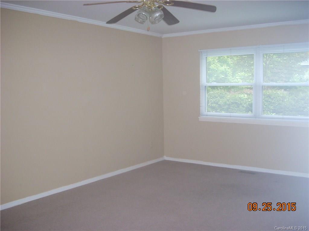9424 Fairway Ridge Road Charlotte, NC 28277 - Photo 9 of 19 an empty room with a window