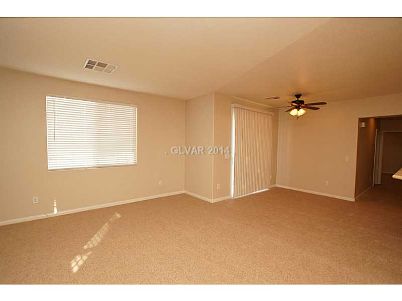 9129 Ripple Ridge Avenue, Unit 101 Las Vegas, NV 89149 - Photo 8 of 14 Family Room.