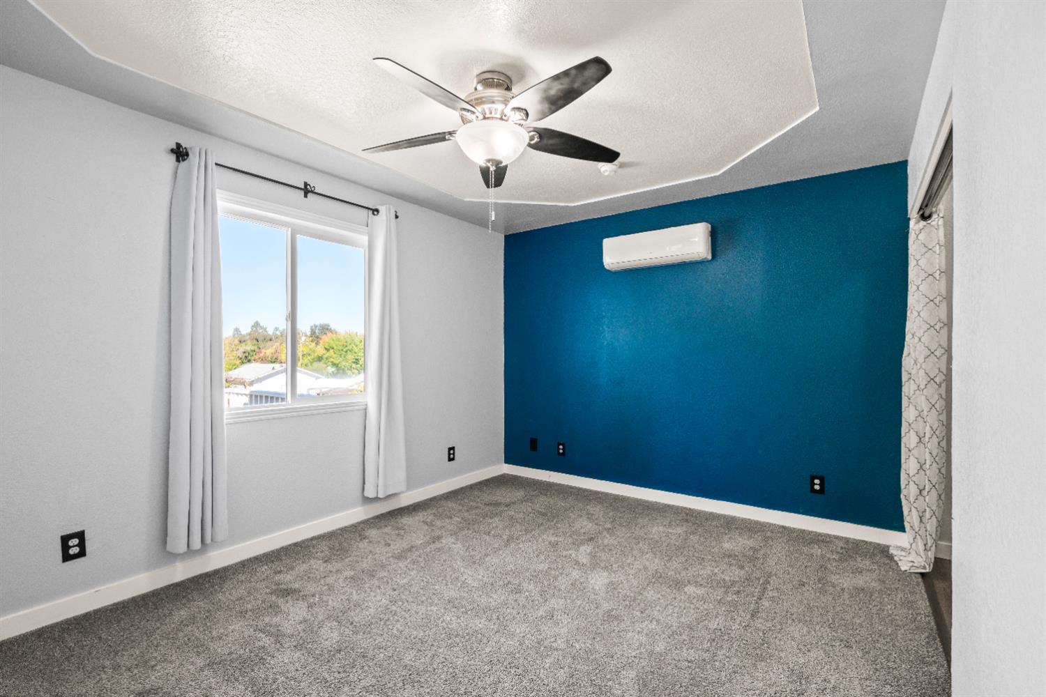 4818 Fall Street El Dorado, CA 95623 - Photo 12 of 31 an empty room with closet and windows