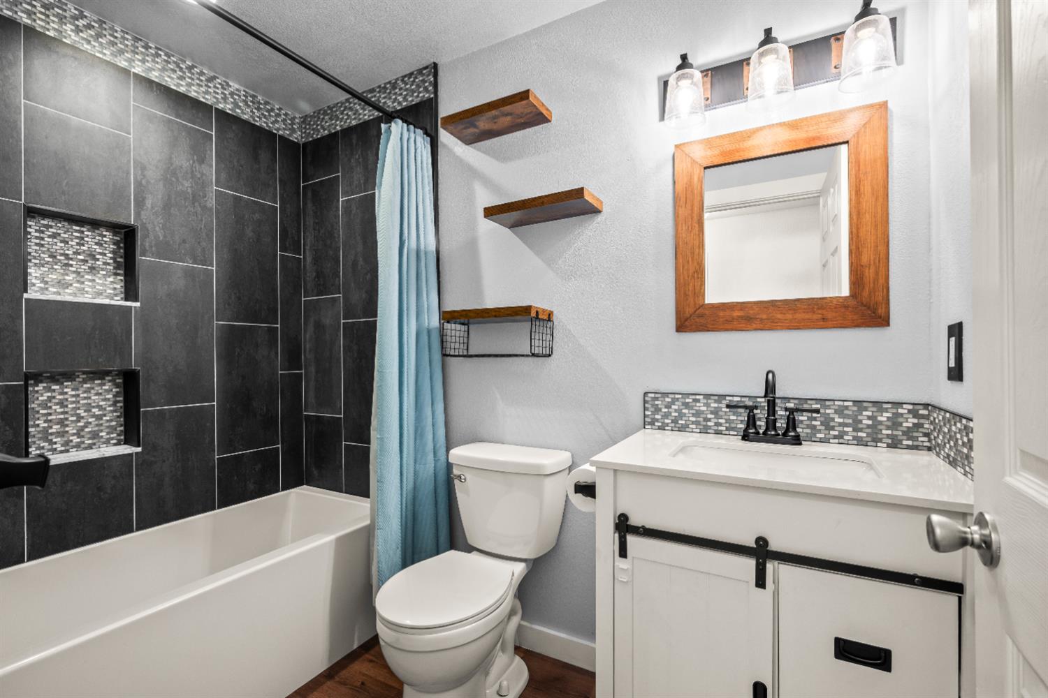 4818 Fall Street El Dorado, CA 95623 - Photo 16 of 31 a bathroom with a sink toilet and shower