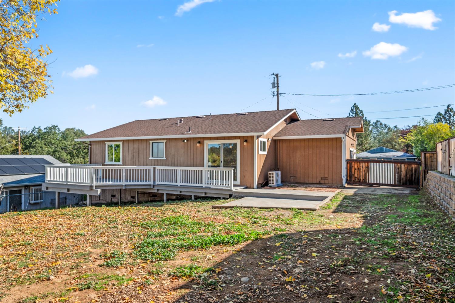4818 Fall Street El Dorado, CA 95623 - Photo 25 of 31 a view of a house with backyard and wooden fence