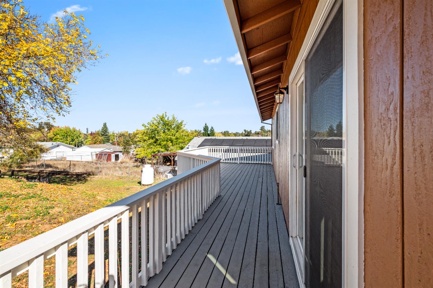 4818 Fall Street El Dorado, CA 95623 - Photo 28 of 31 a view of a balcony with wooden floor and city view