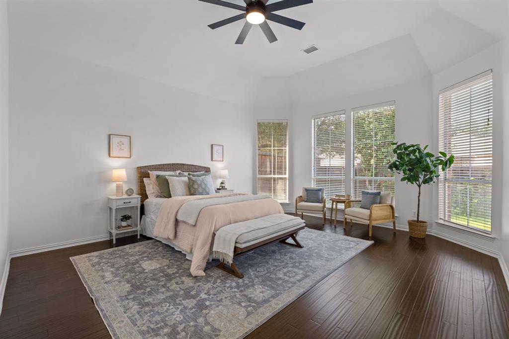 4821 Ravendale Drive Richardson, TX 75082 - Photo 22 of 40 a bedroom with furniture and a large window