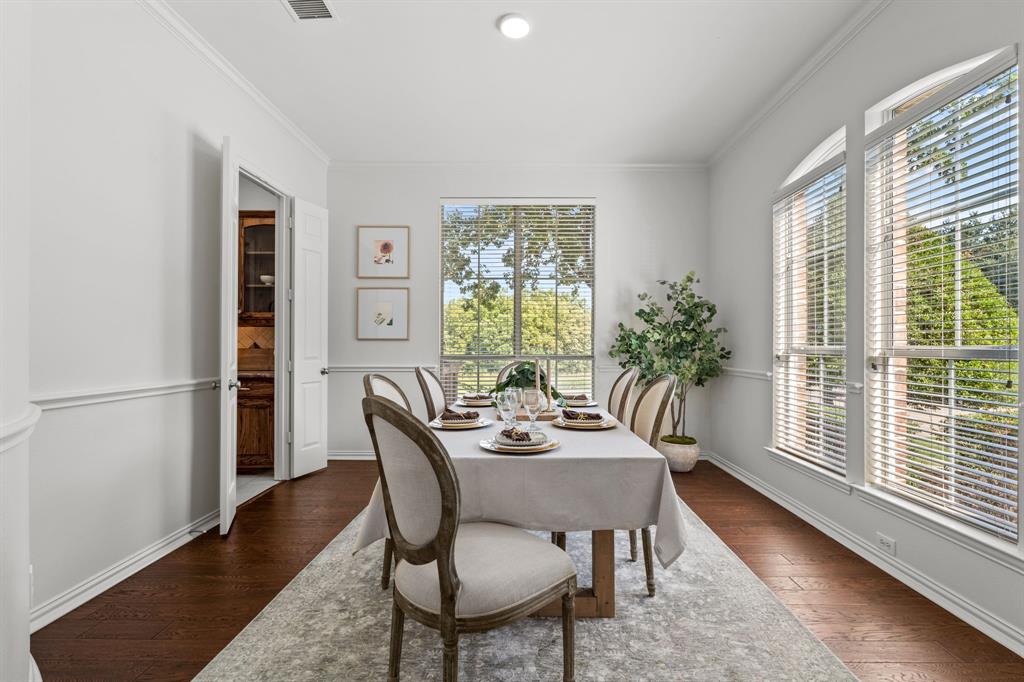 4821 Ravendale Drive Richardson, TX 75082 - Photo 9 of 40 a dining room with furniture and window