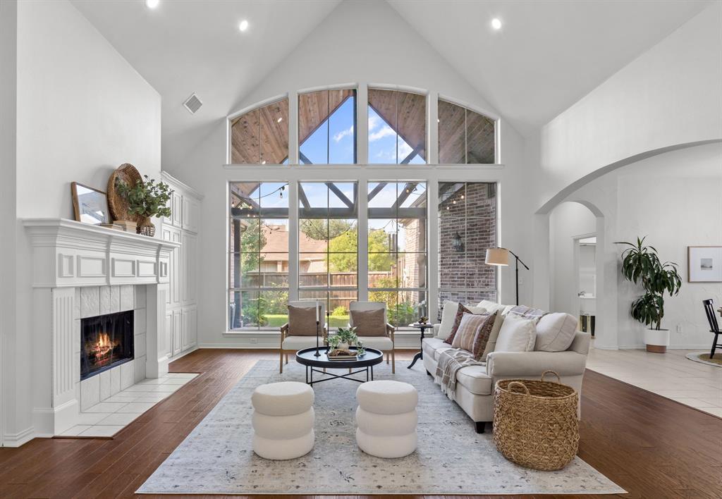 4821 Ravendale Drive Richardson, TX 75082 - Photo 10 of 40 a living room with furniture and a fireplace