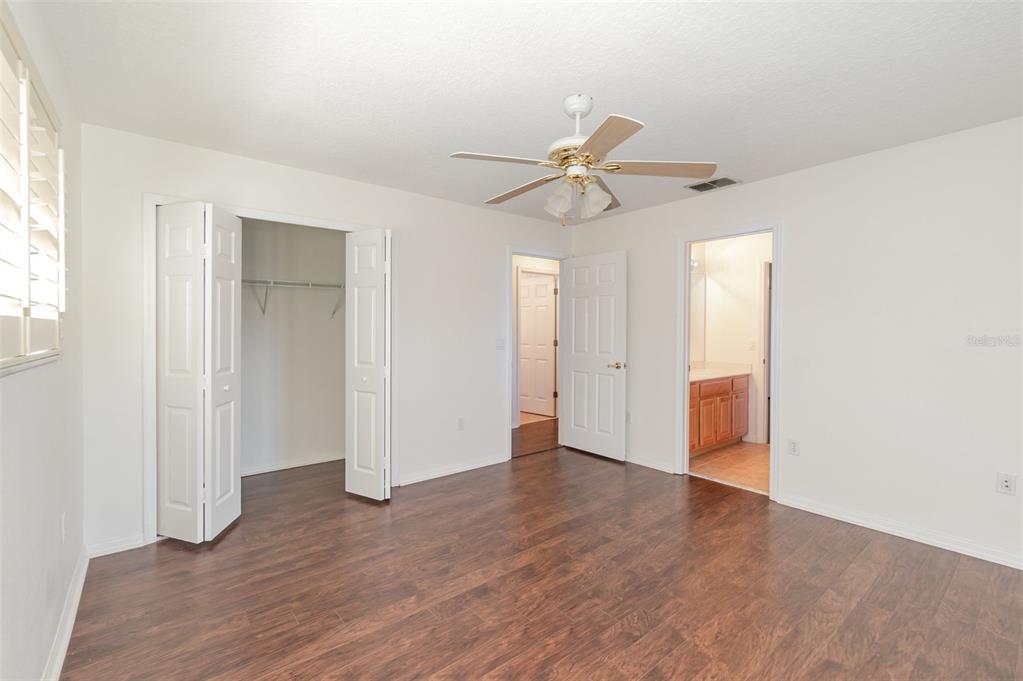 729 Strihal Loop Oakland, FL 34787 - Photo 21 of 33 a view of an empty room with wooden floor