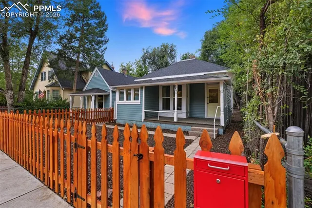 a front view of a house with a porch