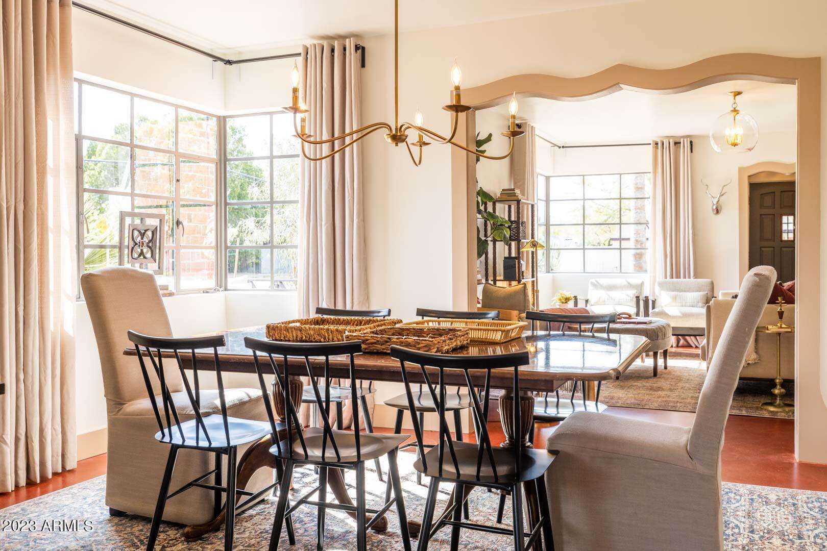 302 West Granada Road Phoenix, AZ 85003 - Photo 21 of 81 a view of a dining room with furniture window and wooden floor