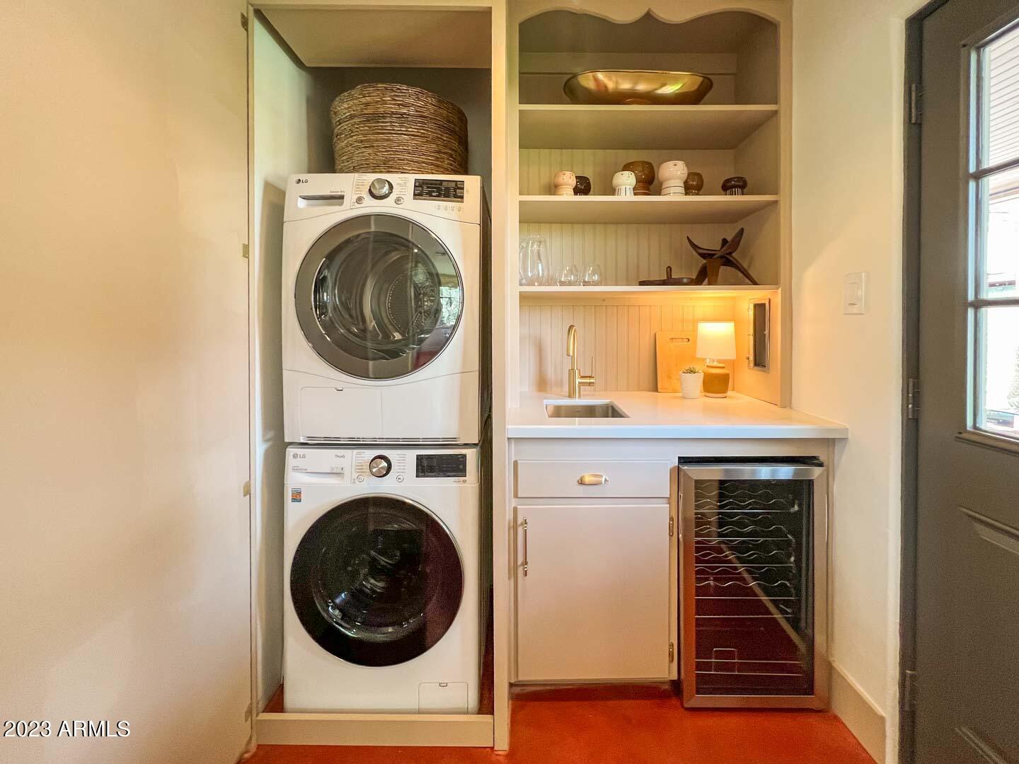 302 West Granada Road Phoenix, AZ 85003 - Photo 39 of 81 a utility room with dryer and washer