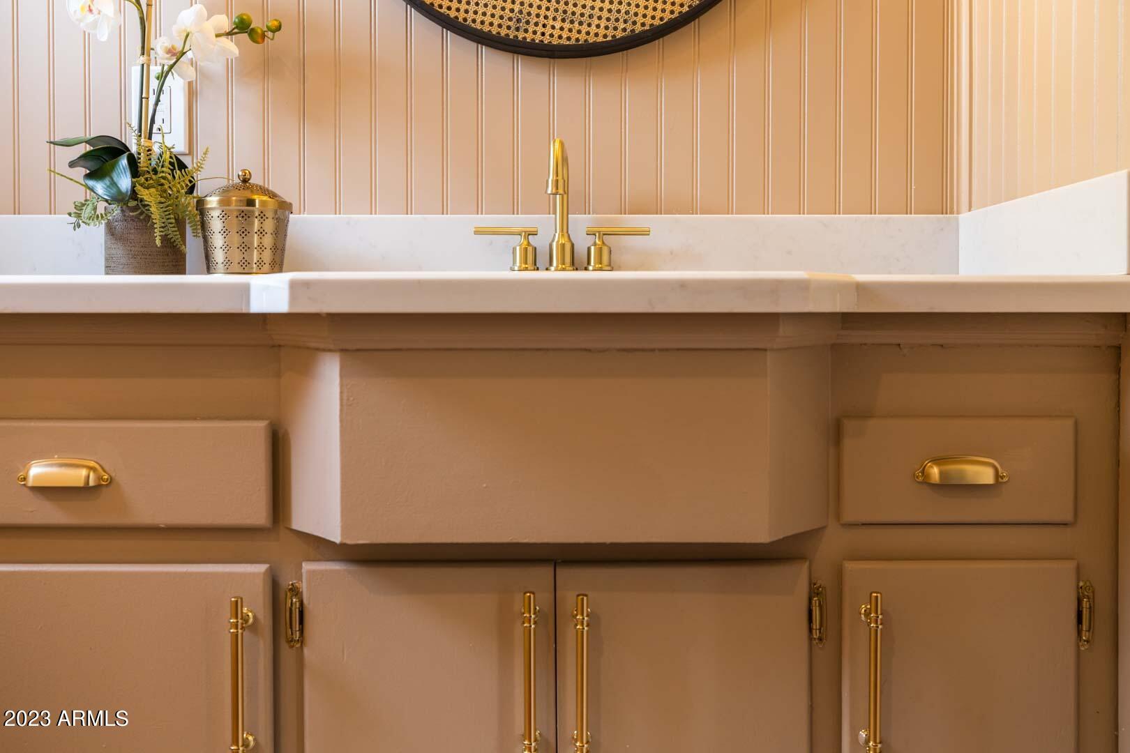 302 West Granada Road Phoenix, AZ 85003 - Photo 46 of 81 a bathroom with a sink and a mirror