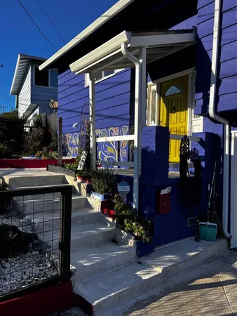 a view of a house with door and deck