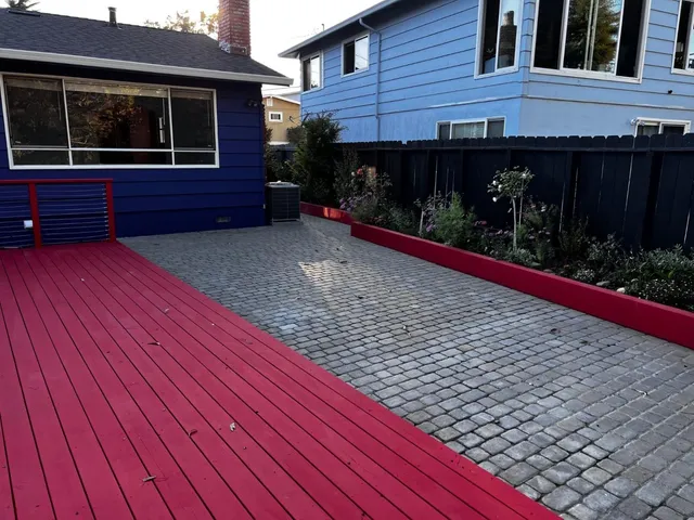 a view of a backyard with flowers