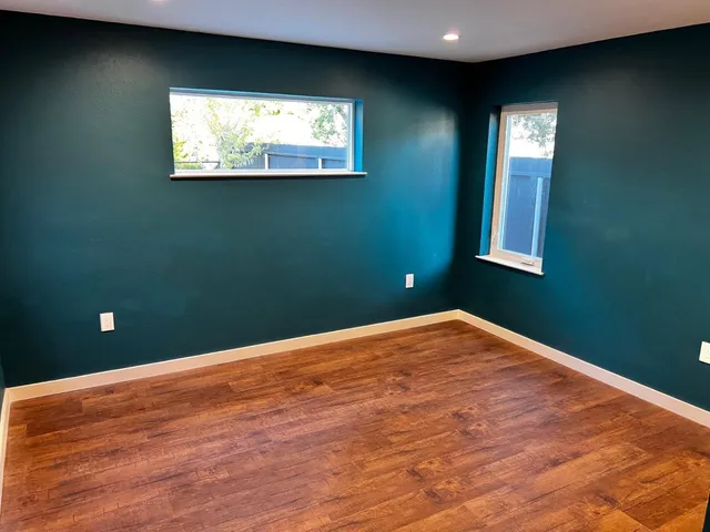 a backyard of a house with lots of green space