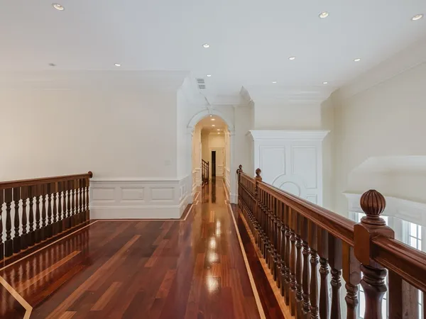 a view of entryway with wooden floor