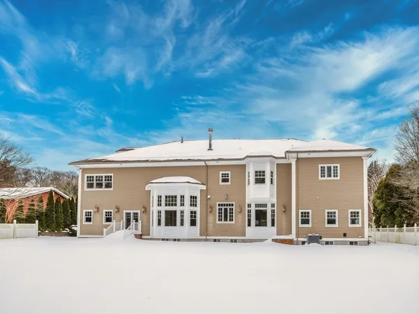 a front view of residential houses with yard