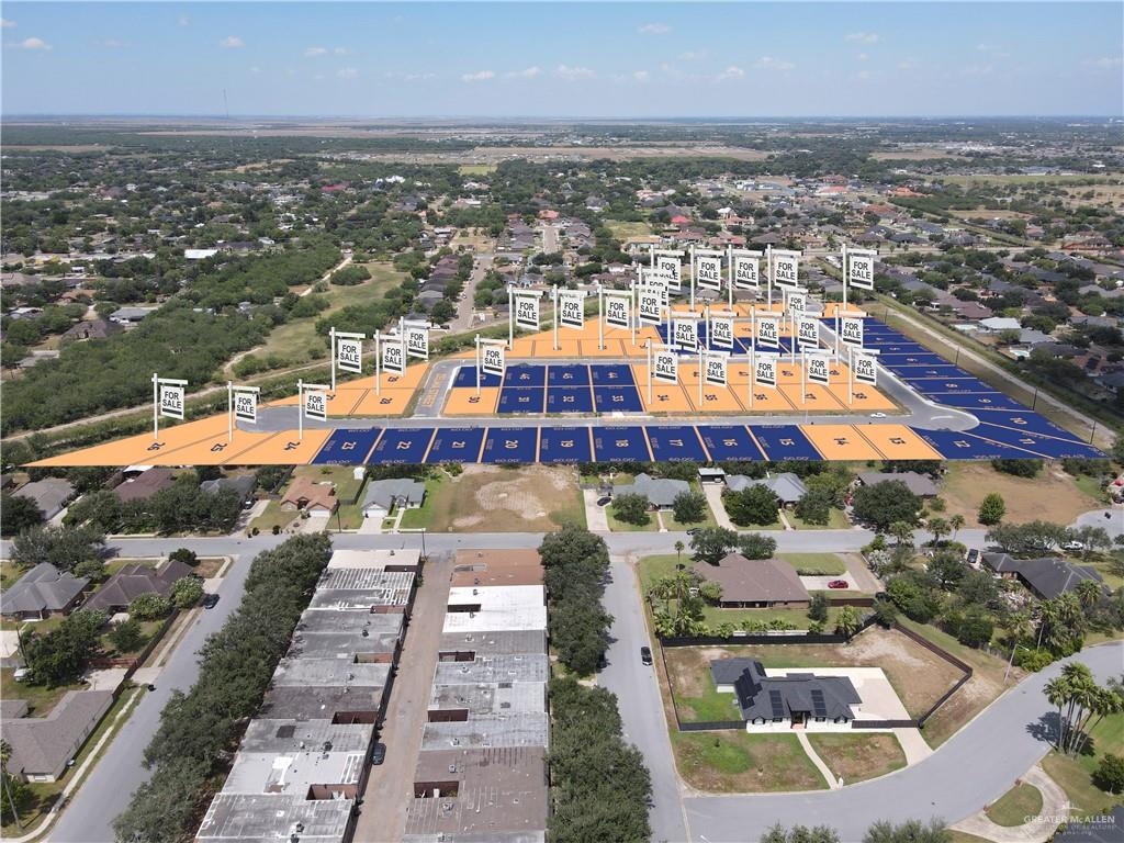 616 Bridge Street Weslaco, TX 78596 - Photo 5 of 6 an aerial view of residential houses with outdoor space