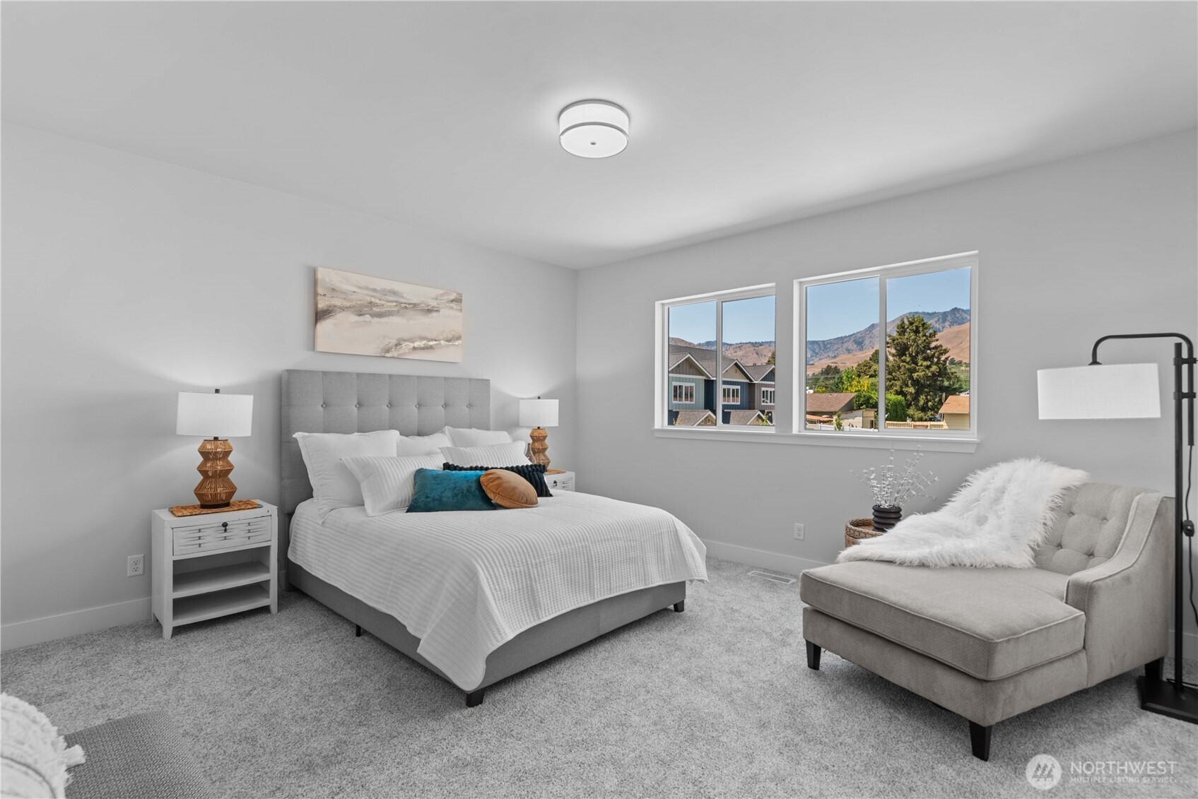 1030 Finch Lane, Unit A1 Wenatchee, WA 98801 - Photo 18 of 28 a bedroom with a bed and a couch