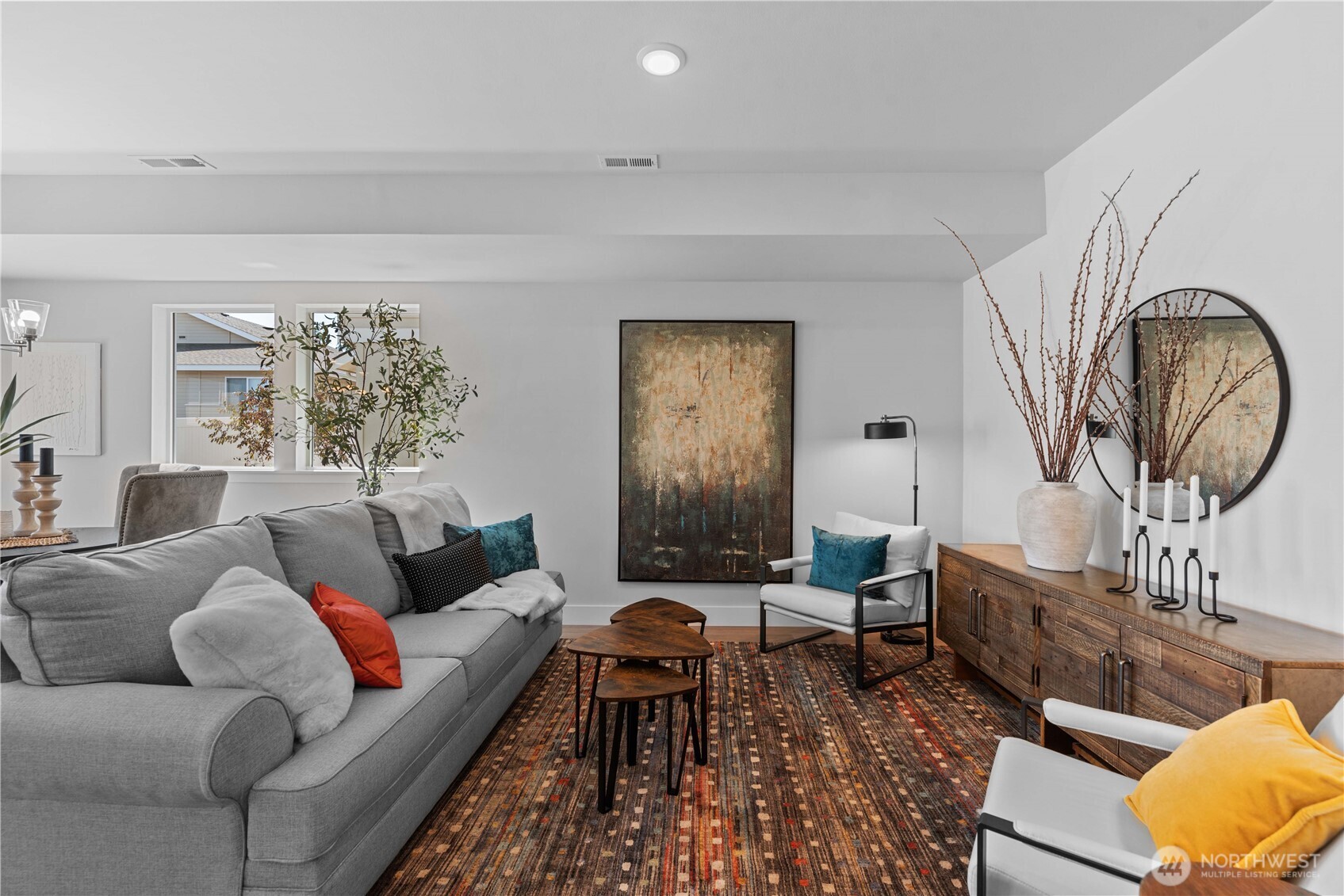 1030 Finch Lane, Unit A1 Wenatchee, WA 98801 - Photo 5 of 28 a living room with furniture and a large mirror