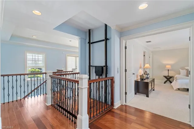 a view of a livingroom with furniture and hardwood floor