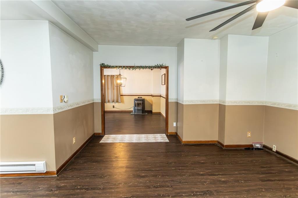 1001 Springfield Pike Connellsville, PA 15425 - Photo 22 of 35 a view of a room with wooden floor