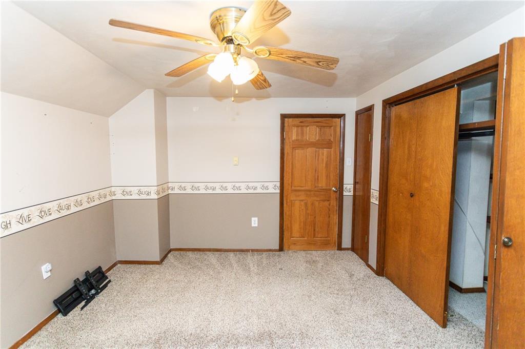 1001 Springfield Pike Connellsville, PA 15425 - Photo 30 of 35 a view of a livingroom with a ceiling fan and window