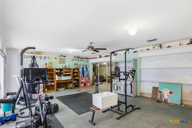 a view of a room with gym equipment