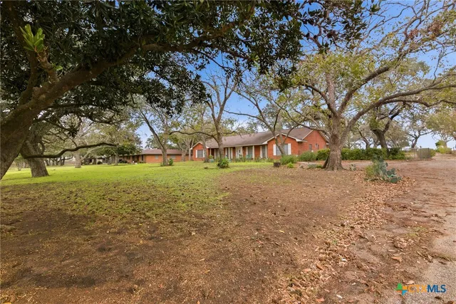 a view of house with outdoor space