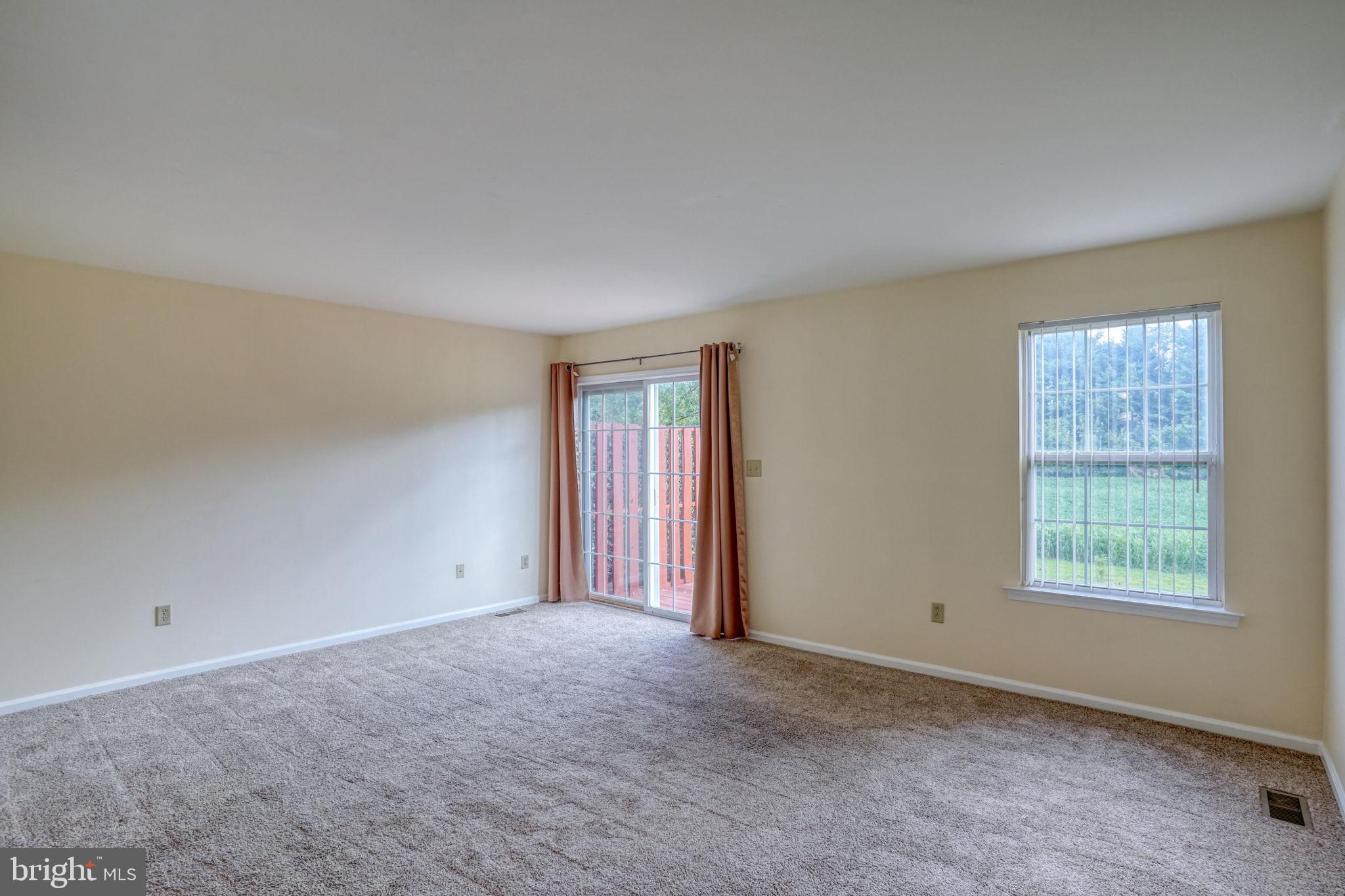 197 Bonnybrook Road Middletown, DE 19709 - Photo 11 of 32 an empty room with windows and closet