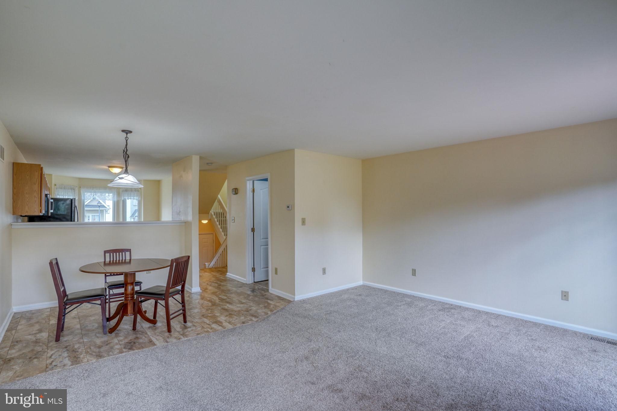 197 Bonnybrook Road Middletown, DE 19709 - Photo 13 of 32 a view of dining room with furniture and chandelier