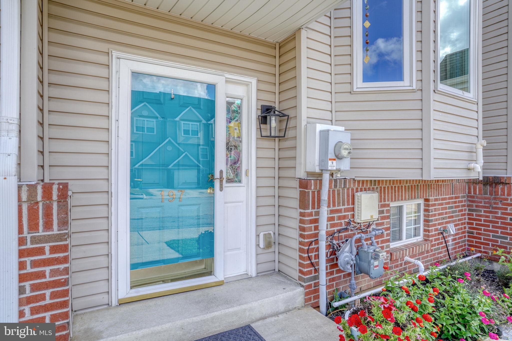 197 Bonnybrook Road Middletown, DE 19709 - Photo 2 of 32 a view of potted plant front of a house