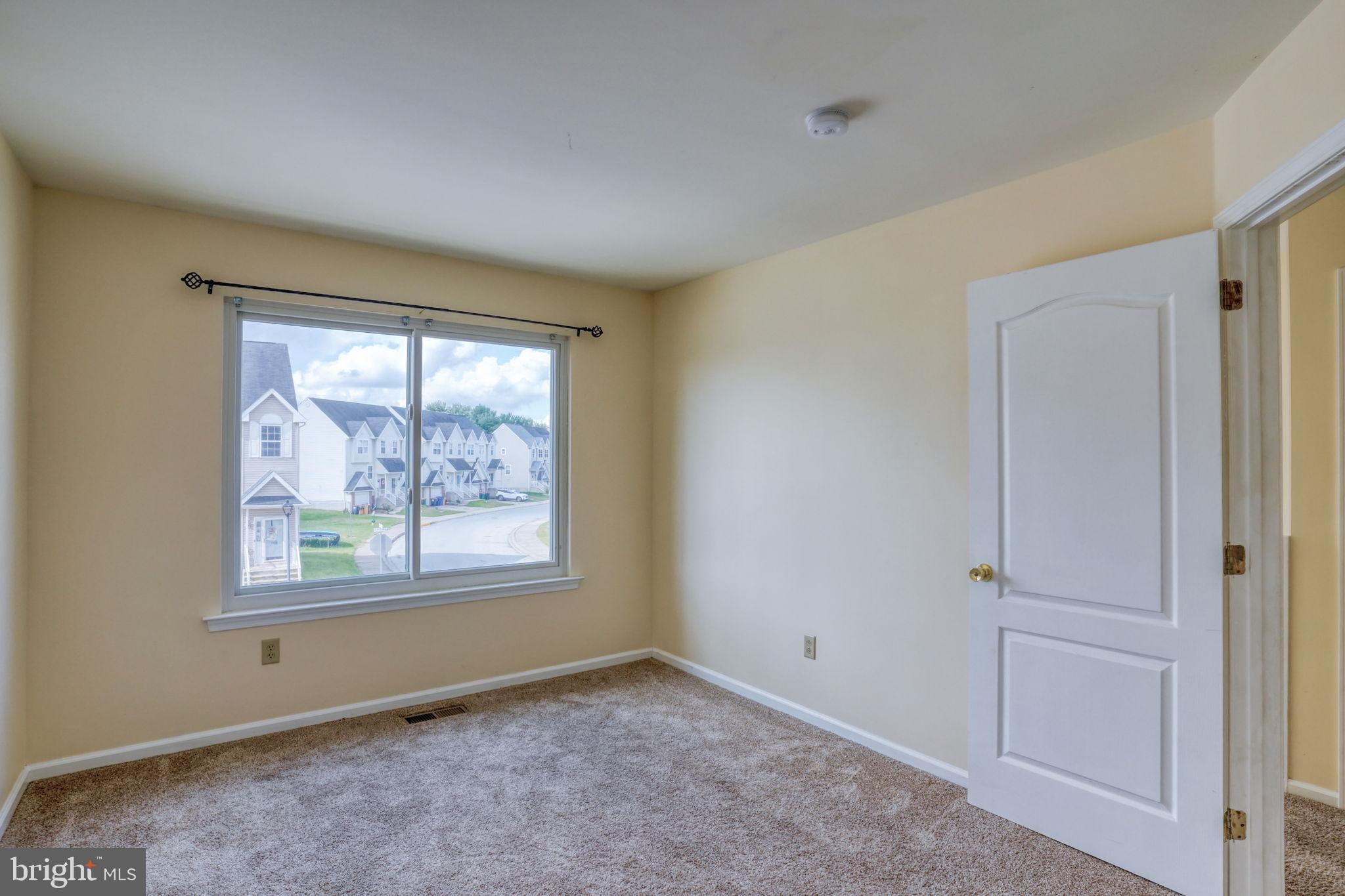 197 Bonnybrook Road Middletown, DE 19709 - Photo 21 of 32 an empty room with windows and closet