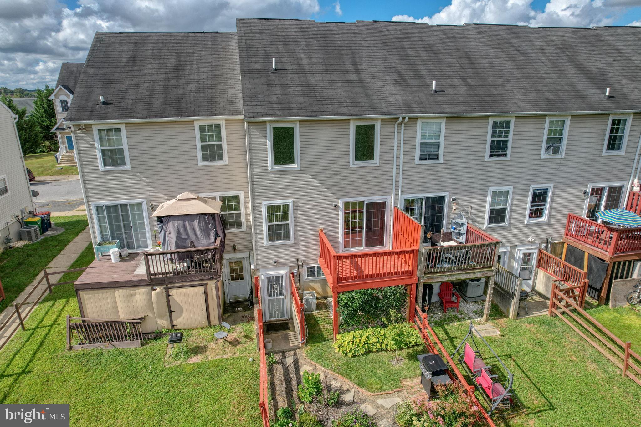 197 Bonnybrook Road Middletown, DE 19709 - Photo 25 of 32 a front view of a house with a yard table and chairs