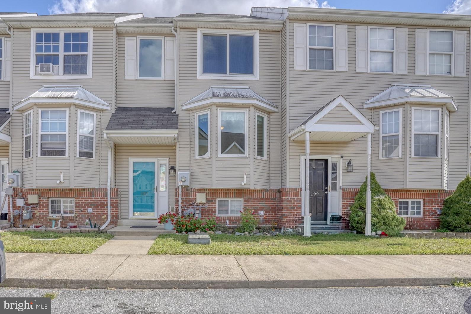 197 Bonnybrook Road Middletown, DE 19709 - Photo 32 of 32 a front view of a house with a yard and a garage