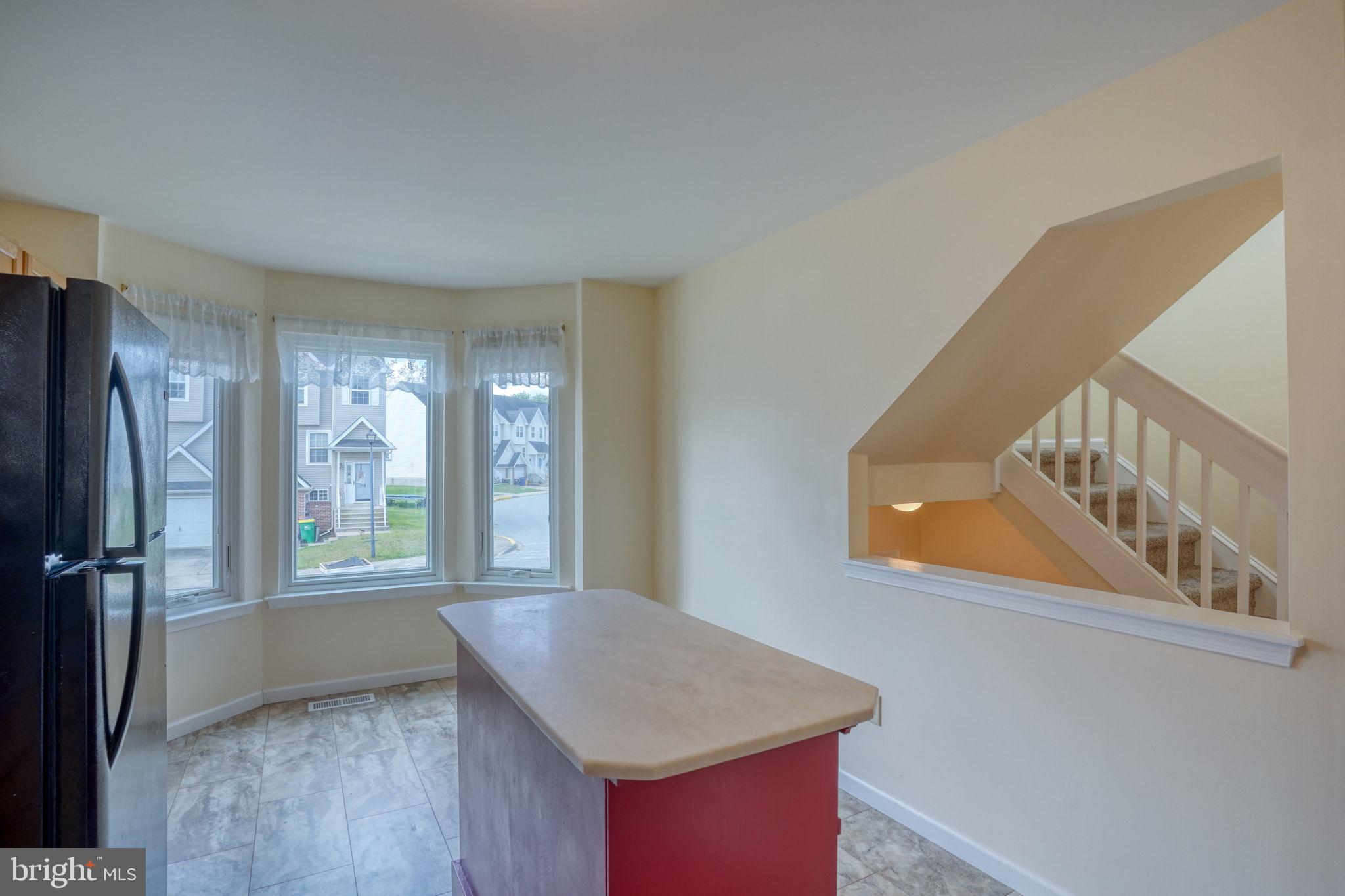 197 Bonnybrook Road Middletown, DE 19709 - Photo 7 of 32 a view of an empty room with a window
