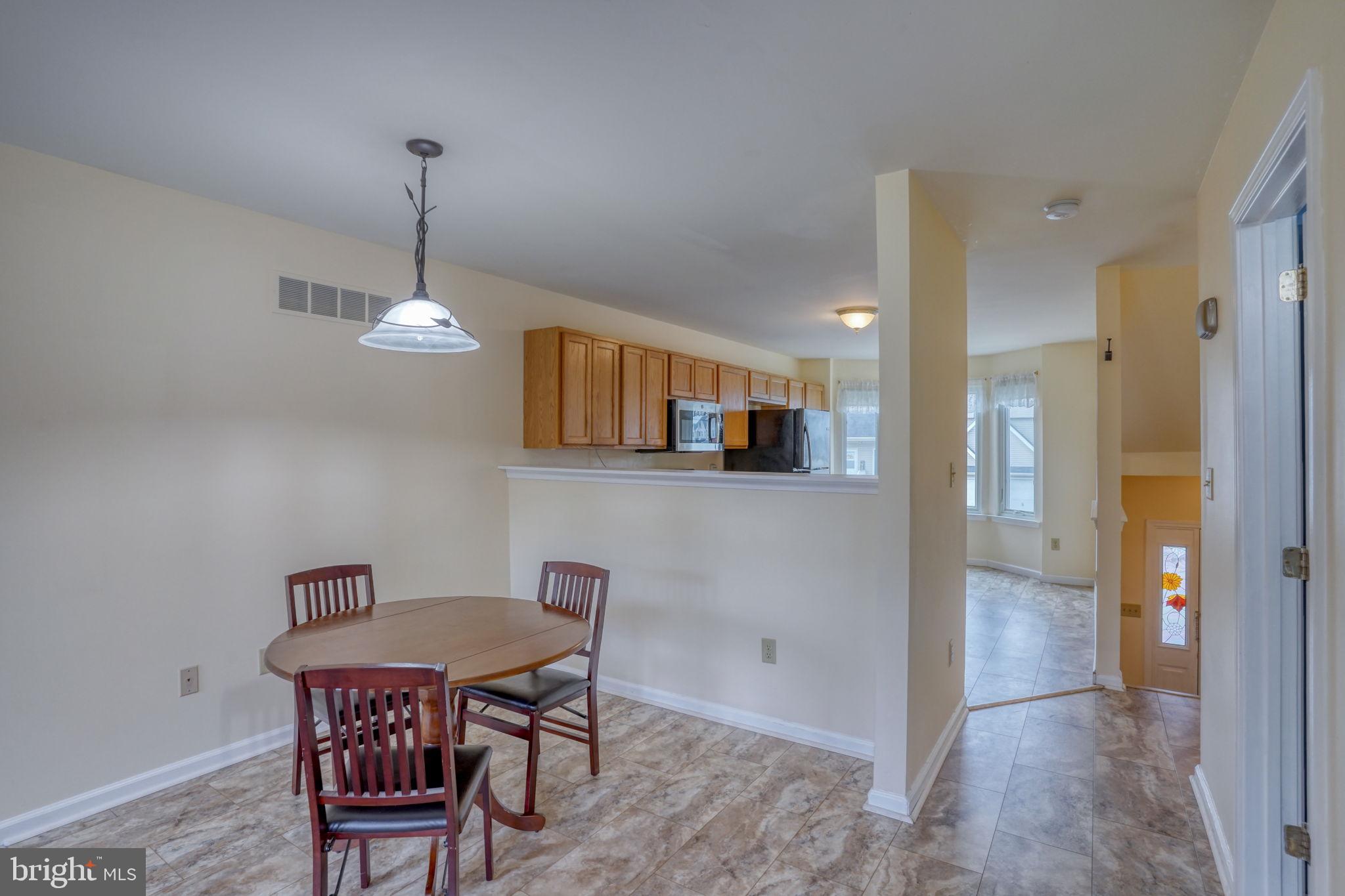 197 Bonnybrook Road Middletown, DE 19709 - Photo 8 of 32 a view of a dining room with furniture