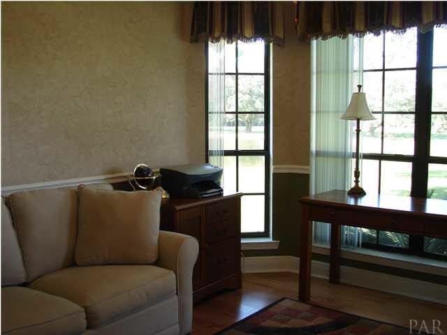 3675 Willard Norris Road Pace, FL 32571 - Photo 21 of 22 Additional Bedroom with Views of Pond