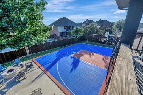 a view of swimming pool with a patio