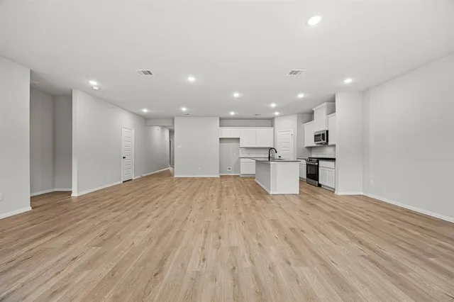 an empty room with windows