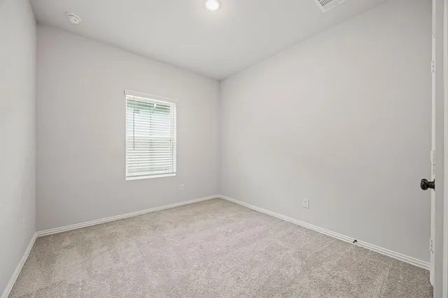 an empty room with closet