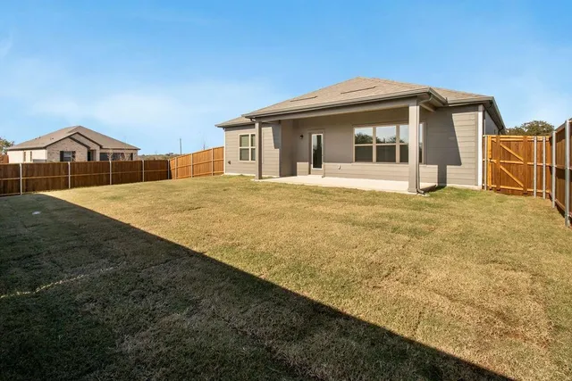 a front view of a house with a outdoor space