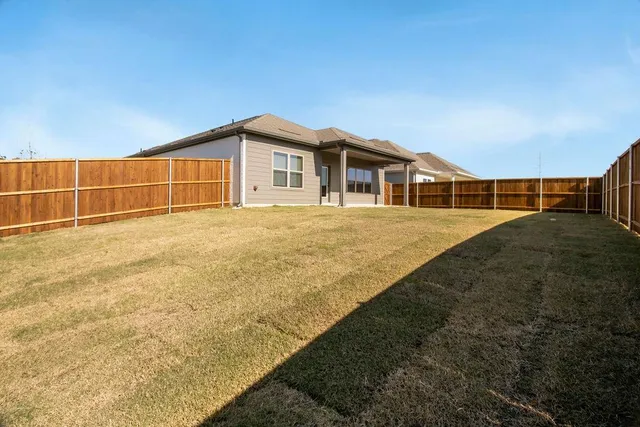 a view of an outdoor space and swimming pool