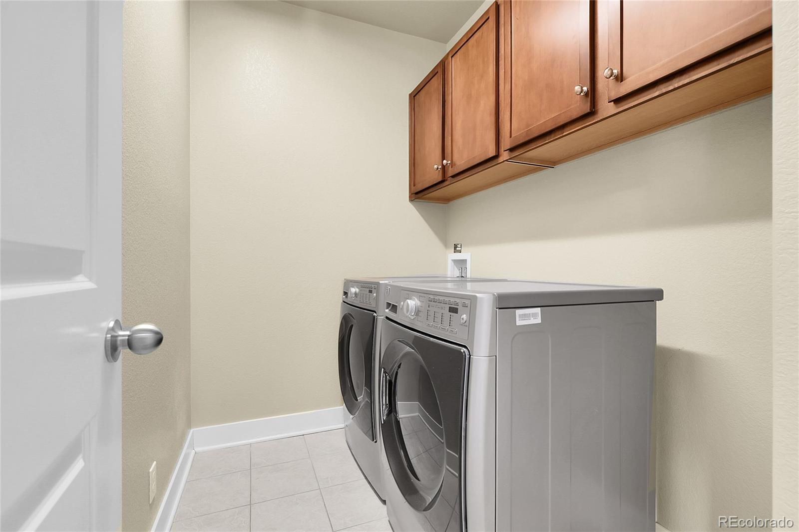 368 Dallas Street Denver, CO 80230 - Photo 22 of 39 a utility room with dryer and washer
