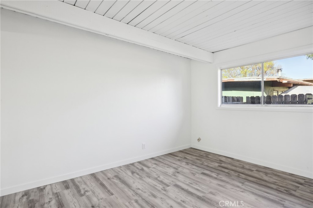528 Creston Road Paso Robles, CA 93446 - Photo 30 of 46 a view of empty room with wooden floor and fan