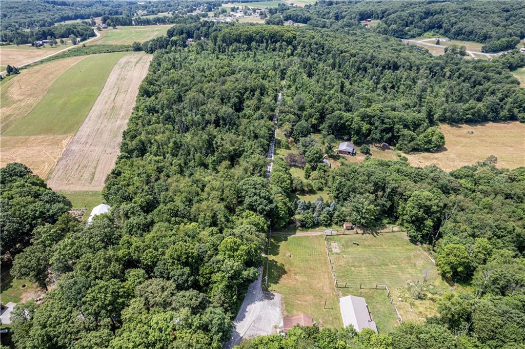 0 Conover Pass Road Acme, PA 15610 - Photo 2 of 3 an aerial view of a residential houses with outdoor space and trees all around