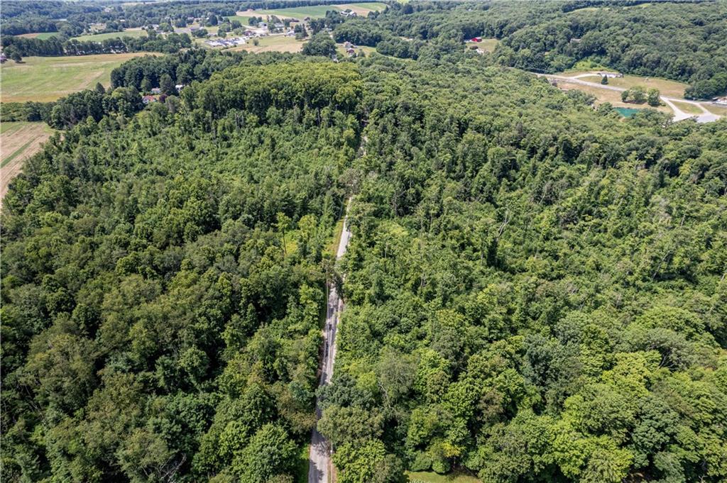 0 Conover Pass Road Acme, PA 15610 - Photo 3 of 3 an aerial view of residential house with outdoor space and trees all around