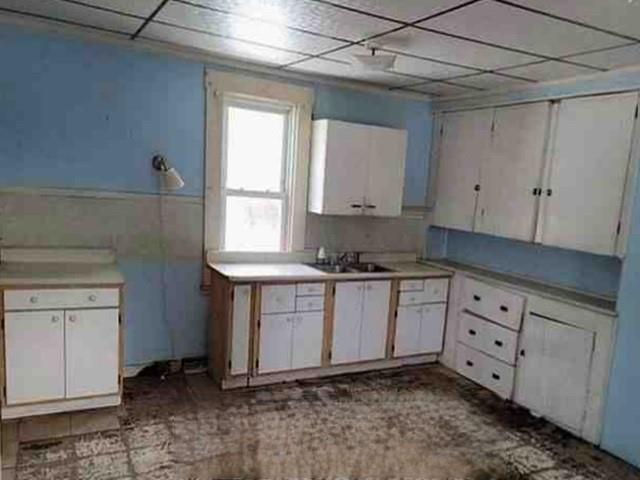 551 Joffre Bulger Road Joffre, PA 15053 - Photo 5 of 9 a kitchen with granite countertop white cabinets and white appliances