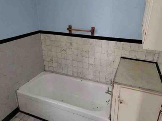 551 Joffre Bulger Road Joffre, PA 15053 - Photo 8 of 9 a bathroom with a bathtub