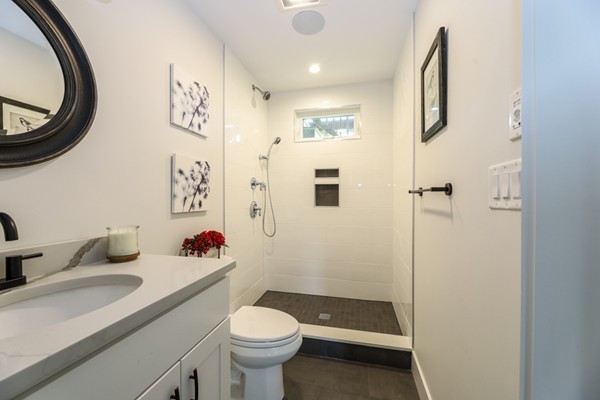 45 Clement Avenue, Unit 3 Boston, MA 02132 - Photo 18 of 35 a bathroom with a sink a toilet and shower