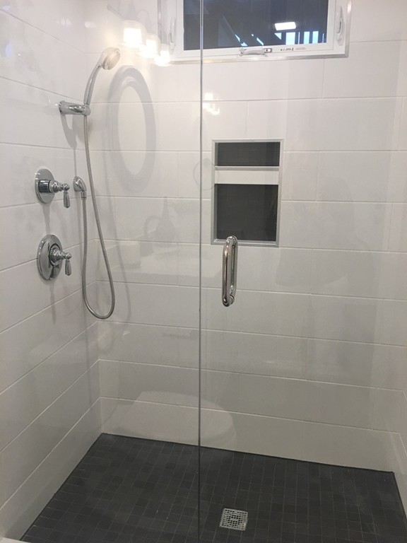 45 Clement Avenue, Unit 3 Boston, MA 02132 - Photo 19 of 35 a bathroom with a shower